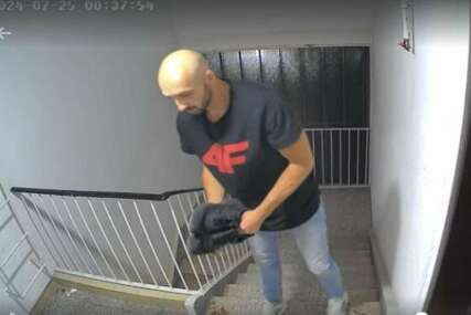 Lopov krade patike u haustoru
