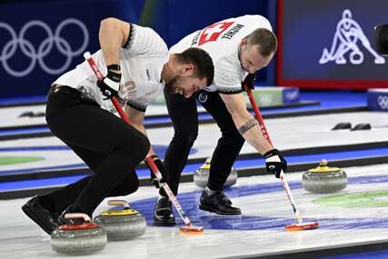 ZOI Švicarci nose medalju u curlingu