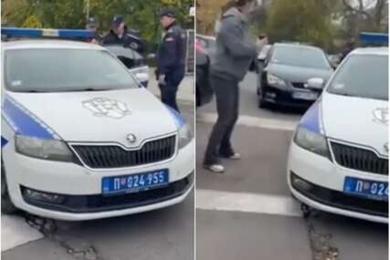 (VIDEO) Policija privela muškarca u Beogradu, on izašao na druga vrata vozila